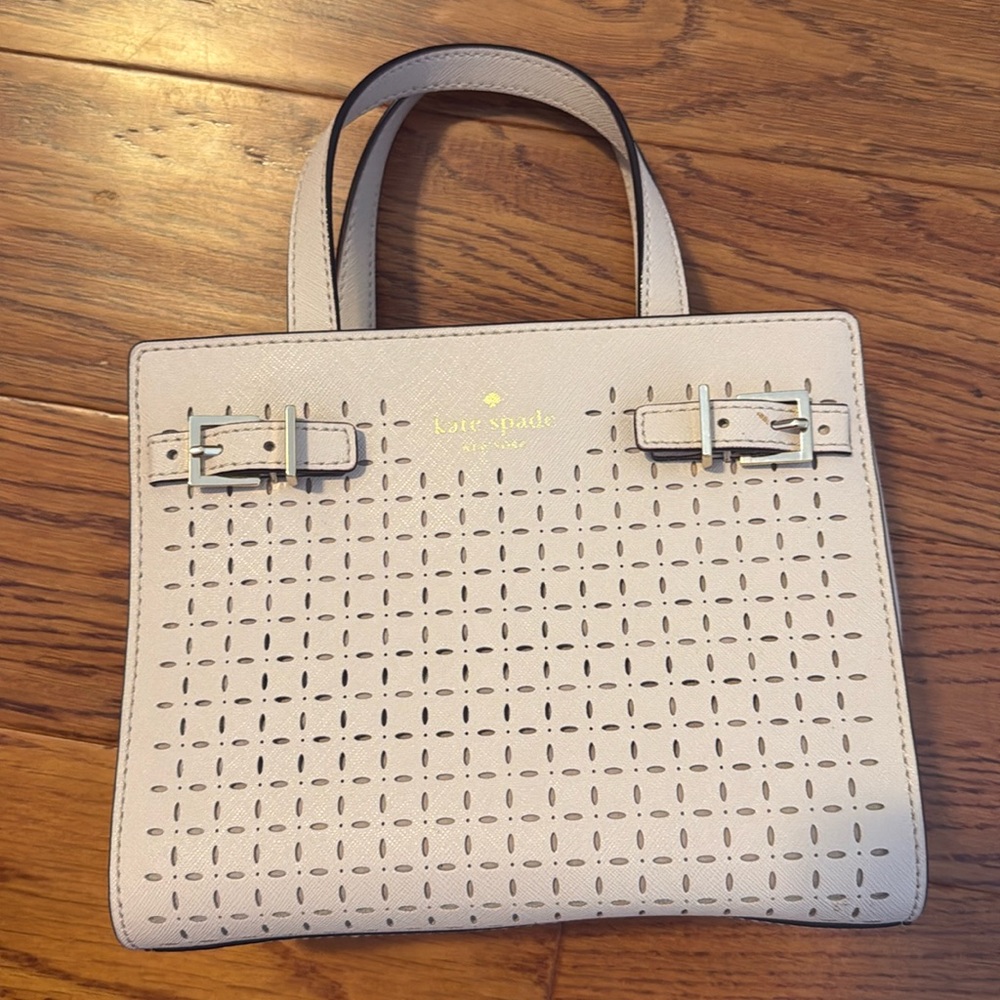Kate Spade cutout design light grey purse with buckles and top handle
